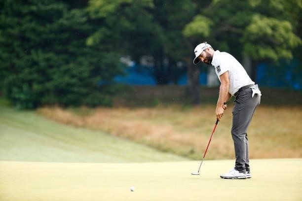 Adam Hadwin of Canada putts on the first green during the final round of the Wyndham Championship at Sedgefield Country Club on August 15, 2021 in...