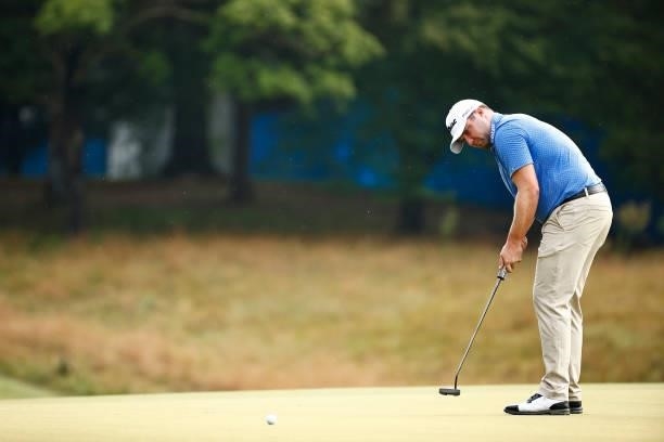 Ben Taylor of England putts on the first green during the final round of the Wyndham Championship at Sedgefield Country Club on August 15, 2021 in...
