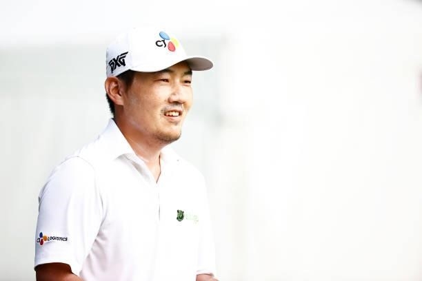 Sung Kang of Korea walks off the second tee during the final round of the Wyndham Championship at Sedgefield Country Club on August 15, 2021 in...