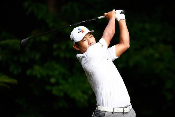 Sung Kang of Korea plays his shot from the second tee during the final round of the Wyndham Championship at Sedgefield Country Club on August 15,...