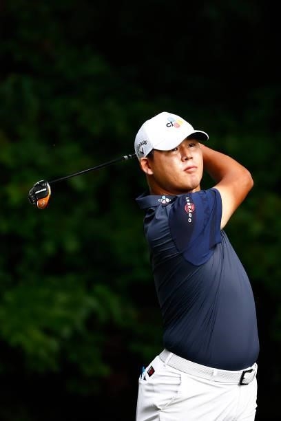Si Woo Kim of South Korea plays his shot from the second tee during the final round of the Wyndham Championship at Sedgefield Country Club on August...
