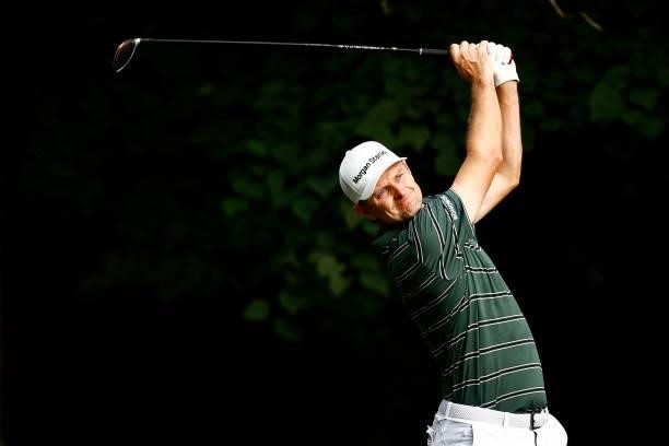 Justin Rose of England plays his shot from the second tee during the final round of the Wyndham Championship at Sedgefield Country Club on August 15,...