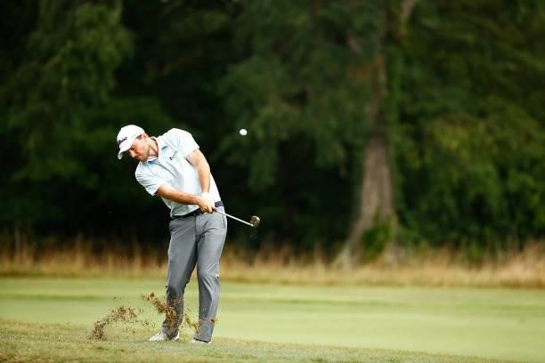Russell Henley of the United States plays an approach shot on the second fairway during the final round of the Wyndham Championship at Sedgefield...