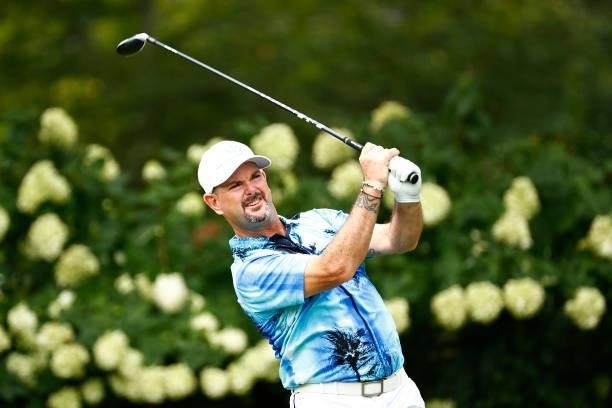 Rory Sabbatini of Slovakia plays his shot from the eighth tee during the final round of the Wyndham Championship at Sedgefield Country Club on August...