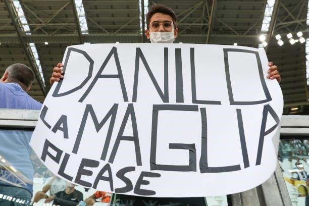 Fan holds up a card asking Danilo of Juventus for his match jersey during the Pre-Season Friendly between Juventus FC and Atalanta BC at Allianz...