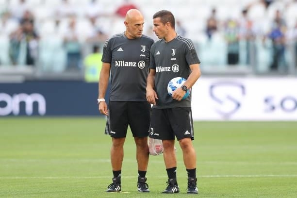 Simone Folletti Juventus Head of Fitness discusses with Simone Padoin Juventus Technical collaborator during the warm up prior to the Pre-Season...
