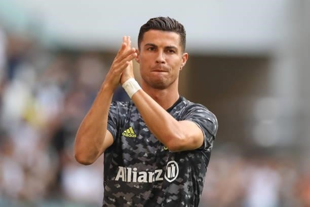 Cristiano Ronaldo of Juventus applauds the public during the warm up prior to the Pre-Season Friendly between Juventus FC and Atalanta BC at Allianz...