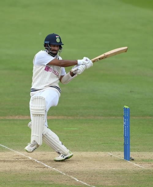 India batsmen Cheteashwar Pujara hits out during day four of the Second Test Match between England and India at Lord's Cricket Ground on August 15,...