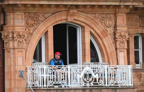 England coach Chris Silverwood looks on from the balcony during day four of the Second Test Match between England and India at Lord's Cricket Ground...