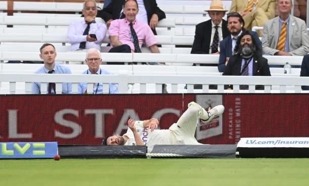 Mark Wood of England injures himself as he attempts to stop a four during the fourth day of the 2nd LV= Test match between England and India at...