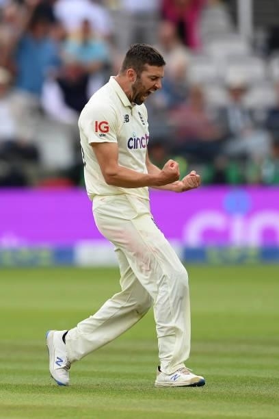 Mark Wood of England celebrates after dismissing Cheteshwar Pujara of India during the Second LV= Insurance Test Match: Day Four between England and...