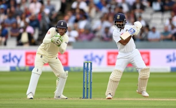 Ajinkya Rahane of India bats watched by England wicketkeeper Jos Buttler during day four of the Second LV= Insurance Test Match between England and...