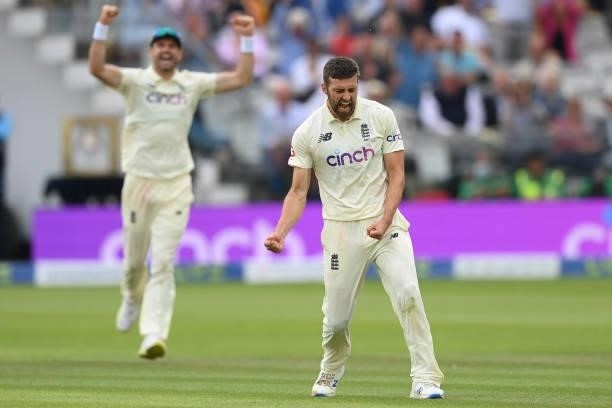 Mark Wood of England celebrates after dismissing Cheteshwar Pujara of India during the Second LV= Insurance Test Match: Day Four between England and...