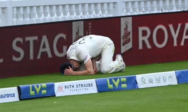 England bowler Mark Wood injures his shoulder after attempting to save a boundary during day four of the Second Test Match between England and India...