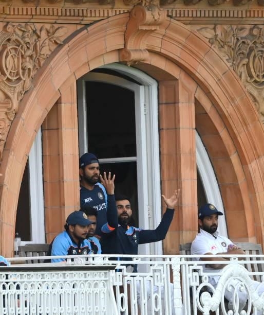 India captain Virat Kohli reacts on the players balcony as the light brings an early finish to the day during day four of the Second Test Match...