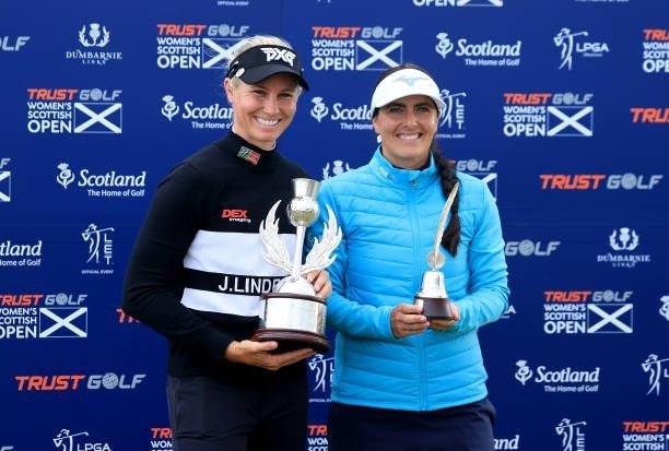 Ryann O'Toole of The United States poses with the winner's trophy with Kelsey MacDonald of Scotland who became the first recipient of the Jock...