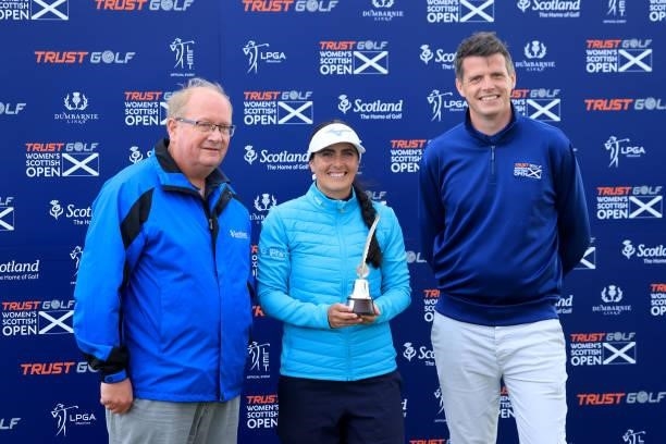 Ryann O'Toole of The United States poses with the trophy with Paul Bush and Alan Grant of VisitScotland after her three shot win in the final round...