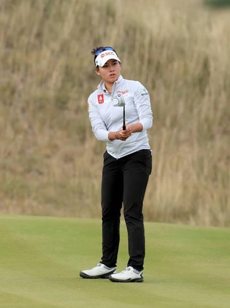 Atthaya Thitikul of Thailand follows her putt on the 10th hole during the final round of the Trust Golf Women's Scottish Open at Dumbarnie Links on...