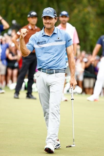 Kevin Kisner of the United States celebrates his birdie putt on the 18th green to win the sudden death second-playoff hole during the final round of...