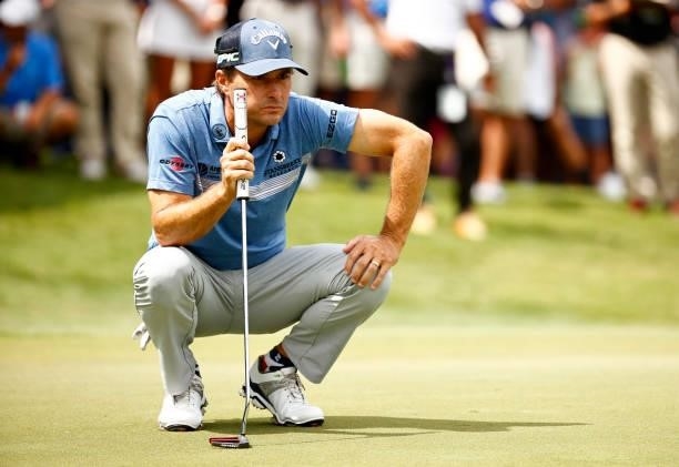 Kevin Kisner of the United States lines up a putt on the 18th green, the second-playoff hole during the final round of the Wyndham Championship at...