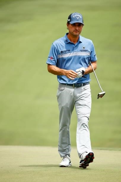 Kevin Kisner of the United States walks to the 18th green, the first-playoff hole in a six-way sudden-death playoff, during the final round of the...