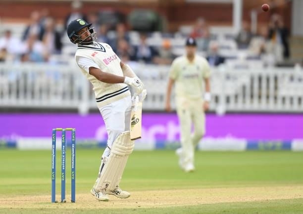 Cheteshwar Pujara of India watches as he is caught by Joe Root of England during the fourth day of the 2nd LV= Test match between England and India...