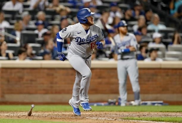 Max Muncy of the Los Angeles Dodgers leaves the batter's box on a two-run home run against the New York Mets in the sixth inning at Citi Field on...
