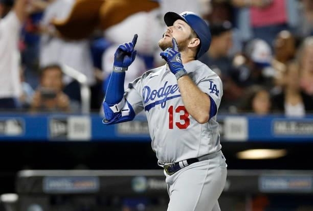 Max Muncy of the Los Angeles Dodgers reacts on the base paths after his two-run home run against the New York Mets in the sixth inning at Citi Field...
