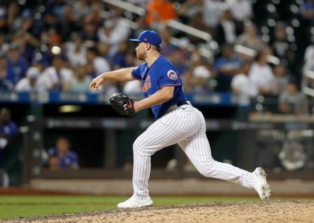 Brandon Drury of the New York Mets pitches in the ninth inning against the Los Angeles Dodgers at Citi Field on August 15, 2021 in New York City. The...