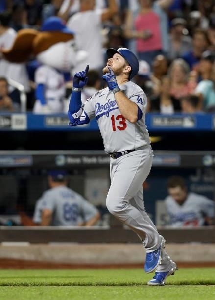 Max Muncy of the Los Angeles Dodgers celebrates his sixth inning two run home run against the New York Mets at Citi Field on August 15, 2021 in New...