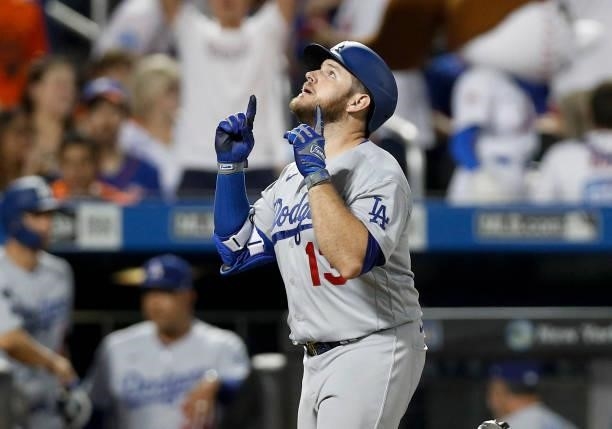 Max Muncy of the Los Angeles Dodgers celebrates his sixth inning two run home run against the New York Mets at Citi Field on August 15, 2021 in New...