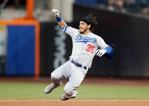 Cody Bellinger of the Los Angeles Dodgers slides into second base on his second inning double against the Los Angeles Dodgers at Citi Field on August...