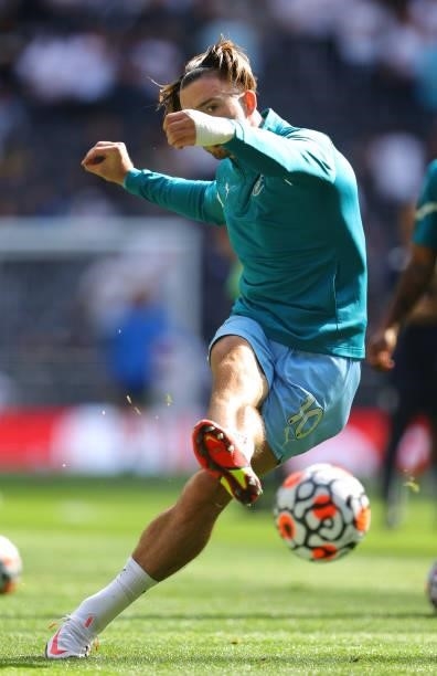 Jack Grealish of Manchester City shoots during the warm up prior to the Premier League match between Tottenham Hotspur and Manchester City at...