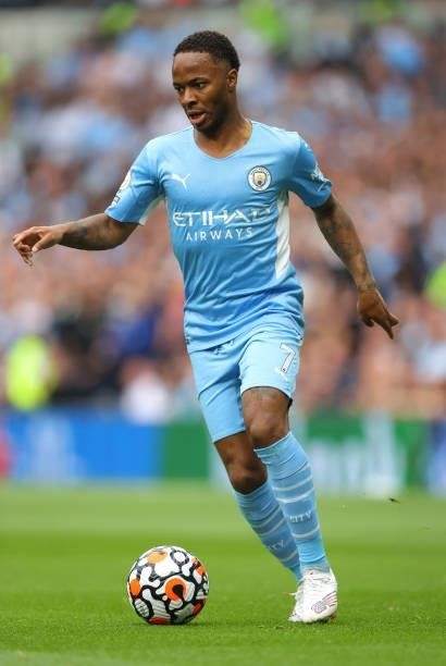 Raheem Sterling of Manchester City runs with the ball during the Premier League match between Tottenham Hotspur and Manchester City at Tottenham...