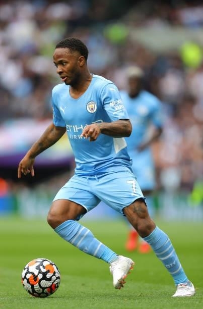 Raheem Sterling of Manchester City runs with the ball during the Premier League match between Tottenham Hotspur and Manchester City at Tottenham...
