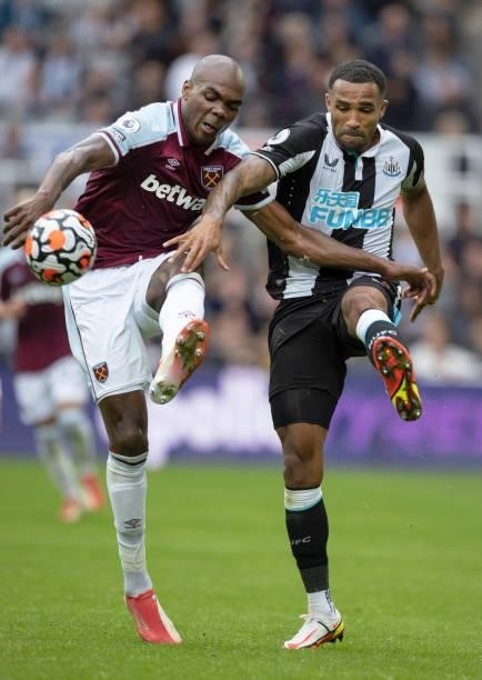 Callum Wilson of Newcastle United and Angelo Ogbonna of West Ham United in action during the Premier League match between Newcastle United and West...