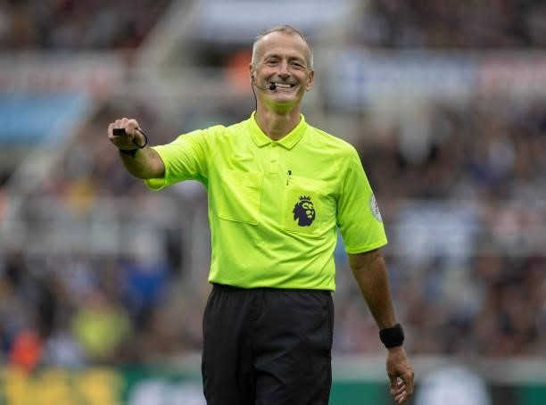 Referee Martin Atkinson during the Premier League match between Newcastle United and West Ham United at St. James Park on August 15, 2021 in...