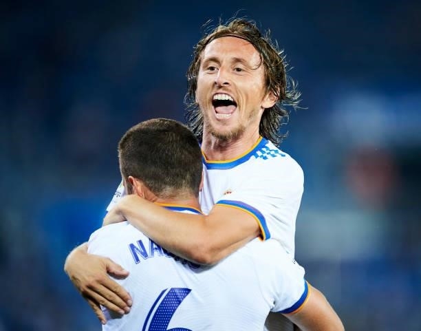 Nacho Fernandez of Real Madrid celebrates with his teammates Luka Modric of Real Madrid after scoring his team's second goal during the LaLiga...