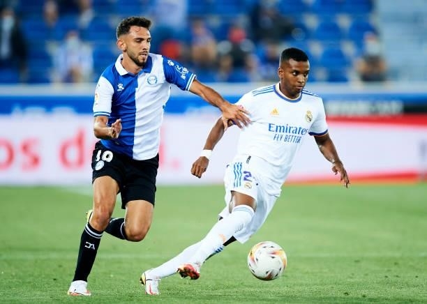 Rodrygo Goes of Real Madrid duels for the ball with Ivan Martin of Deportivo Alaves during the LaLiga Santader match between Deportivo Alaves and...