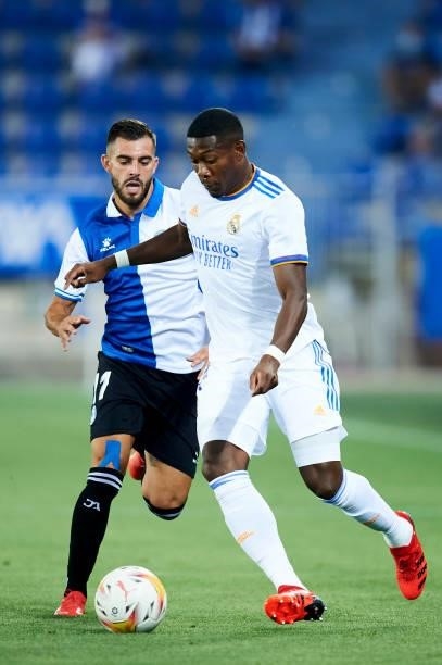 David Alaba of Real Madrid duels for the ball with Luis Rioja of Deportivo Alaves during the LaLiga Santader match between Deportivo Alaves and Real...