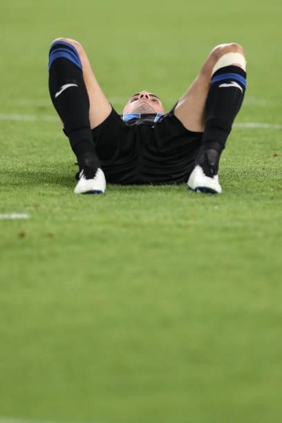 Merih Demiral of Atalanta lays on his back after taking a knock during the Pre-Season Friendly between Juventus FC and Atalanta BC at Allianz Stadium...