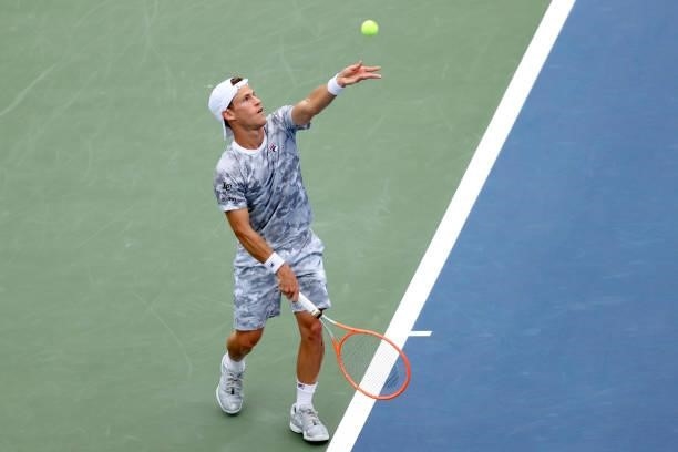 Diego Schwartzman of Argentina serves to Daniel Evans of Great Britain during the Western & Southern Open at Lindner Family Tennis Center on August...