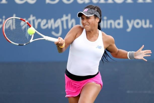 Heather Watson of Great Britain returns a shot to Aliaksandra Sasnovich of Belarus during the Western & Southern Open at Lindner Family Tennis Center...