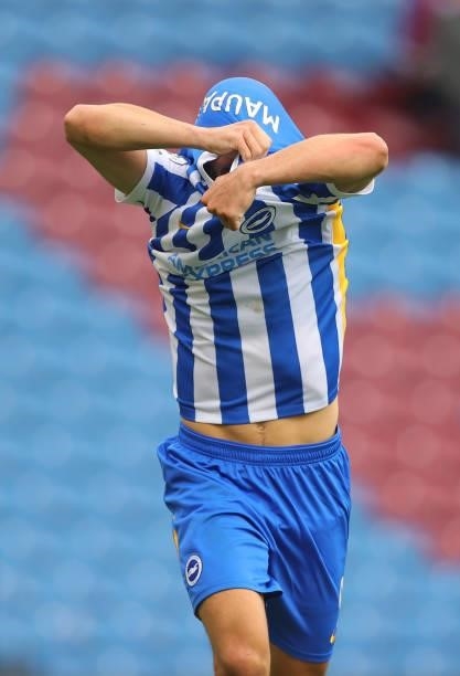 Neal Maupay of Brighton & Hove Albion takes his shirt off after the Premier League match between Burnley and Brighton & Hove Albion at Turf Moor on...