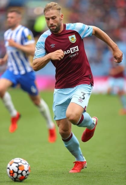 Charlie Taylor of Burnley runs with the ball during the Premier League match between Burnley and Brighton & Hove Albion at Turf Moor on August 14,...