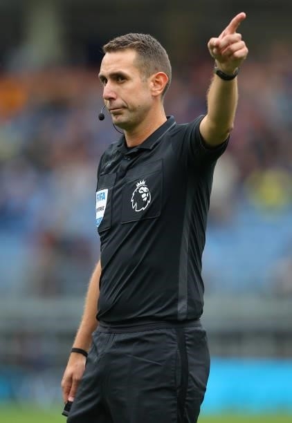 Referee, David Coote during the Premier League match between Burnley and Brighton & Hove Albion at Turf Moor on August 14, 2021 in Burnley, England.
