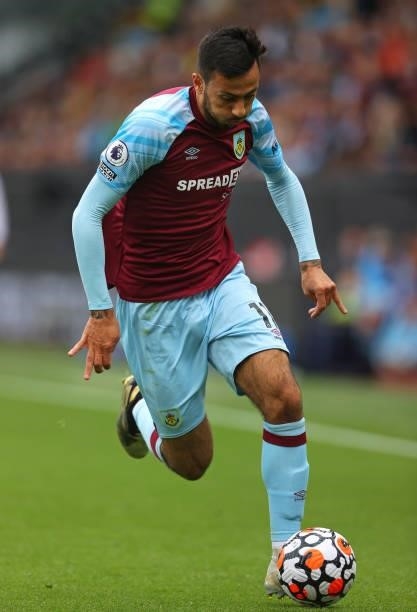 Dwight McNeil of Burnley runs with the ball during the Premier League match between Burnley and Brighton & Hove Albion at Turf Moor on August 14,...