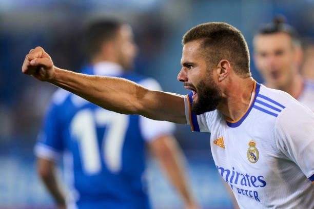Nacho Fernandez of Real Madrid CF celebrates after scoring his team's first goal during the La Liga Santader match between Deportivo Alaves and Real...