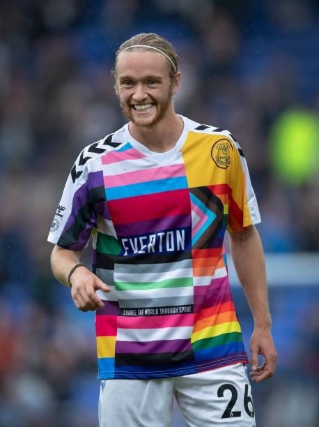Tom Davies of Everton wears a specially designed warm-up shirt to raise awareness for inclusivity in sport before the Premier League match between...