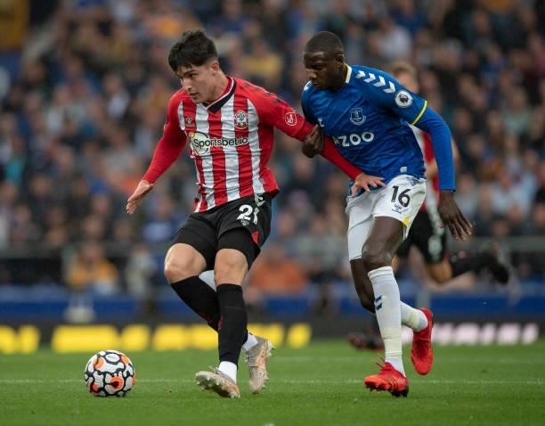 Valentino Livramento of Southampton and Abdoulaye Doucouré of Everton in action during the Premier League match between Everton and Southampton at...